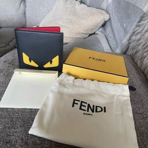 Fendi Black leather Wallet with Yellow Accents and Red Interior